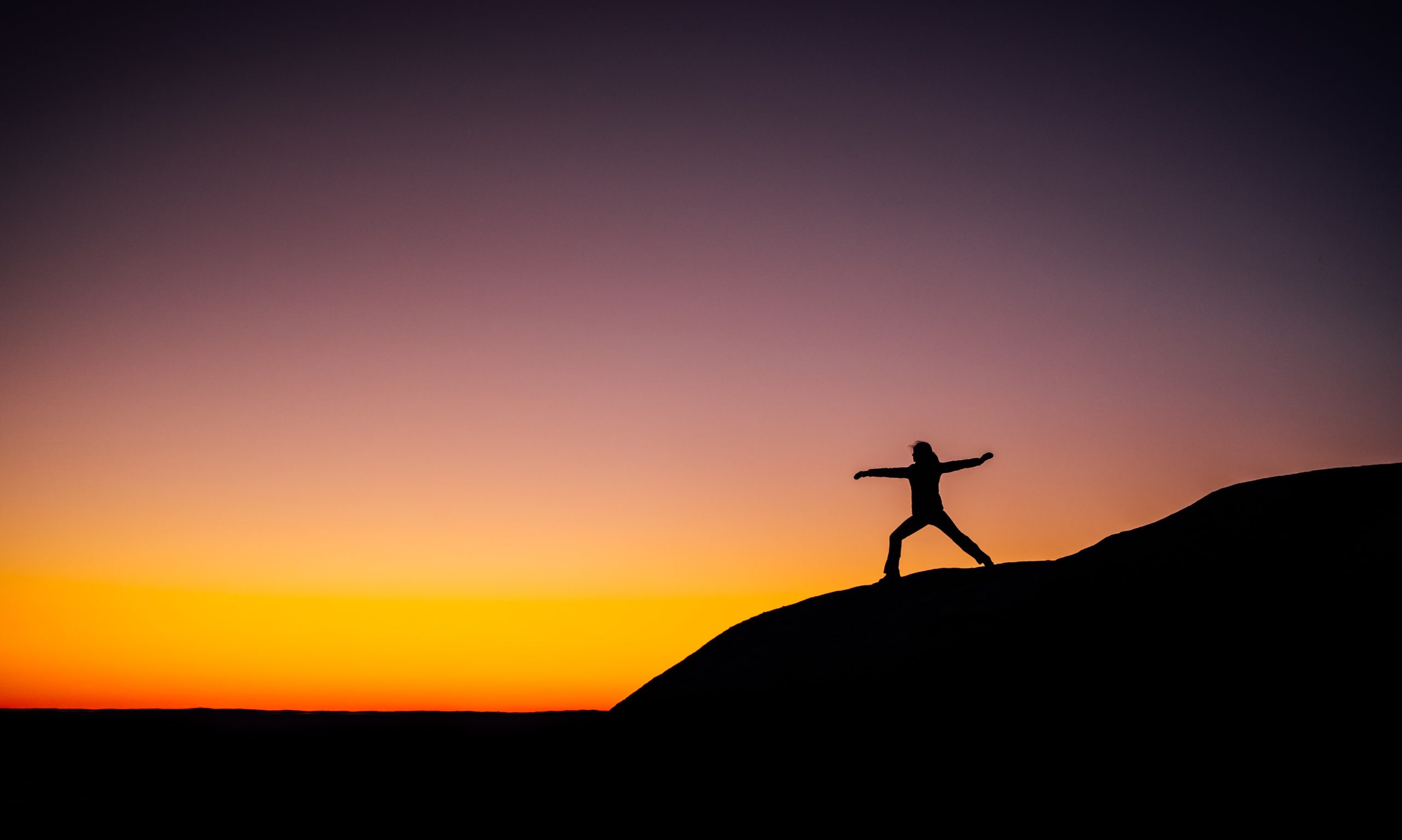 yoga on a mountain top